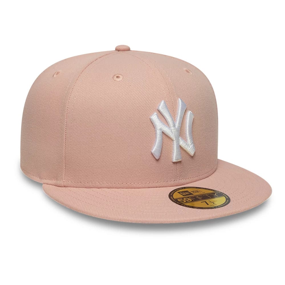 Pictured is this MLB League Essential New York Yankees 59FIFTY Fitted cap in pastel pink. 3
