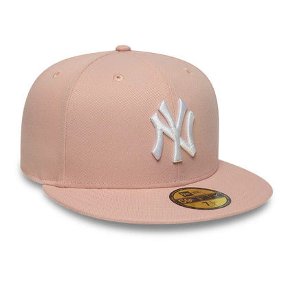 Pictured is this MLB League Essential New York Yankees 59FIFTY Fitted cap in pastel pink. 3