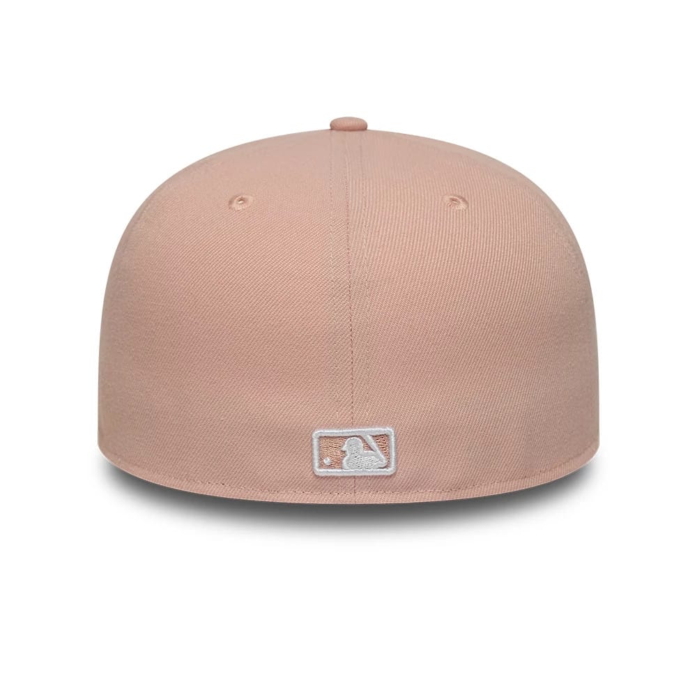 Pictured is this MLB League Essential New York Yankees 59FIFTY Fitted cap in pastel pink. 4