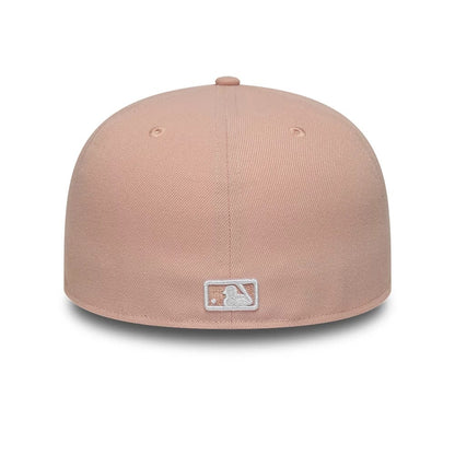 Pictured is this MLB League Essential New York Yankees 59FIFTY Fitted cap in pastel pink. 4