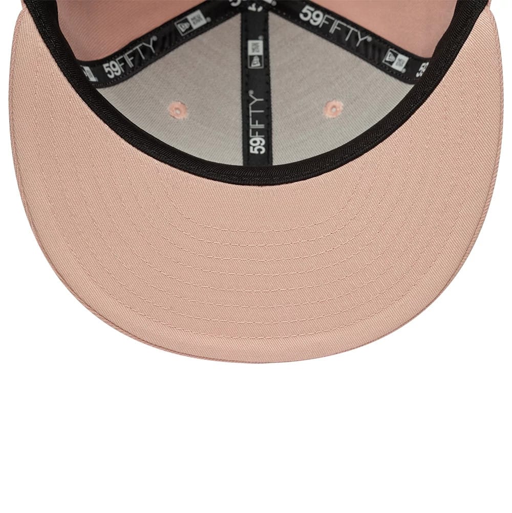 Pictured is this MLB League Essential New York Yankees 59FIFTY Fitted cap in pastel pink. 5