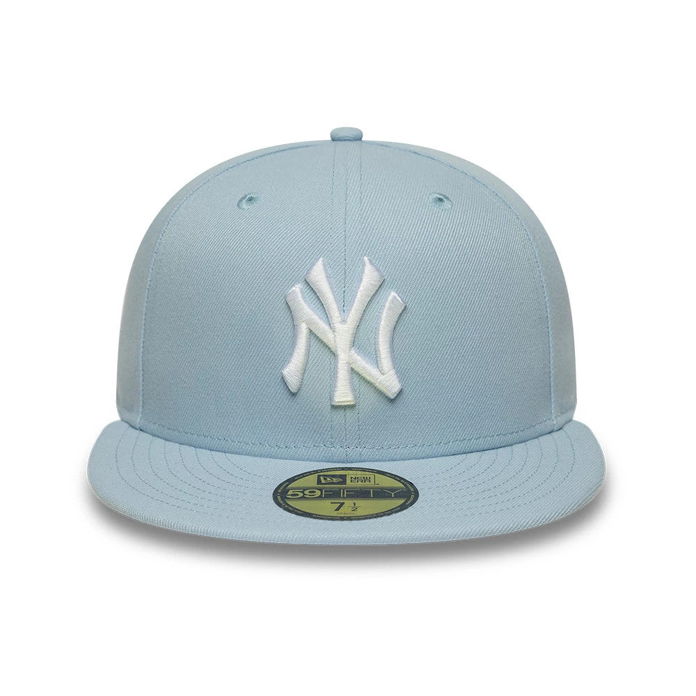 Pictured is this MLB League Essential New York Yankees 59FIFTY Fitted cap in pastel blue. 2