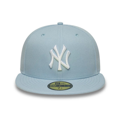 Pictured is this MLB League Essential New York Yankees 59FIFTY Fitted cap in pastel blue. 2
