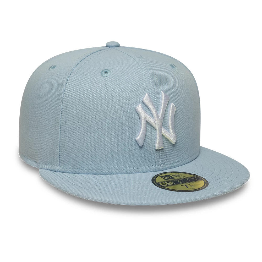 Pictured is this MLB League Essential New York Yankees 59FIFTY Fitted cap in pastel blue. 3