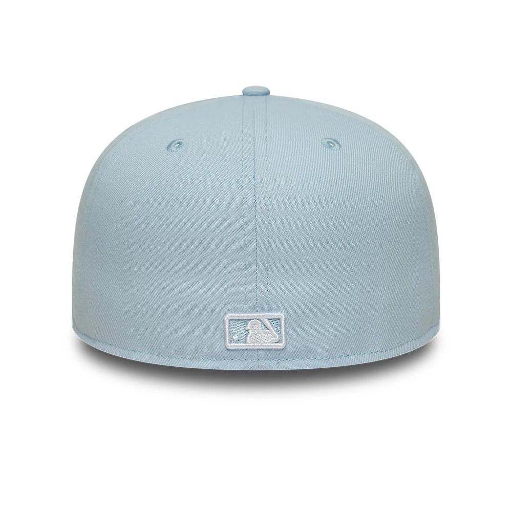 Pictured is this MLB League Essential New York Yankees 59FIFTY Fitted cap in pastel blue. 4