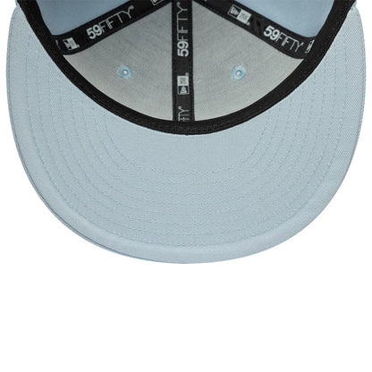 Pictured is this MLB League Essential New York Yankees 59FIFTY Fitted cap in pastel blue. 5