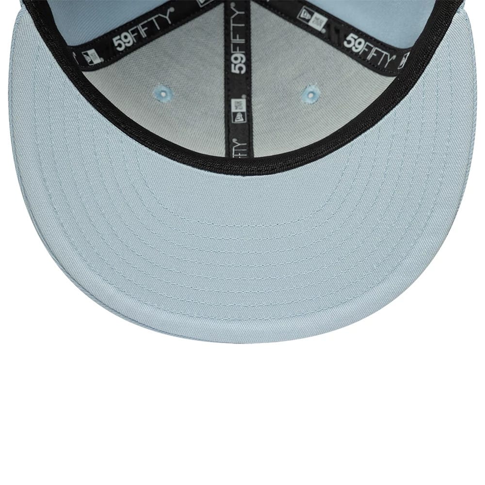 Pictured is this MLB League Essential New York Yankees 59FIFTY Fitted cap in pastel blue. 5