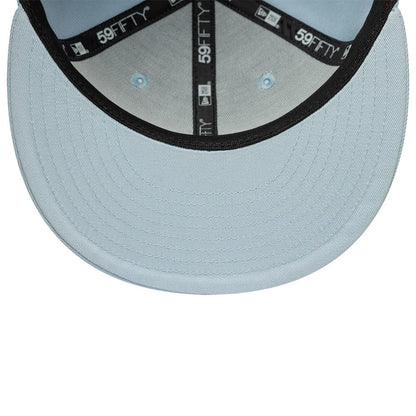 Pictured is this MLB League Essential New York Yankees 59FIFTY Fitted cap in pastel blue. 5