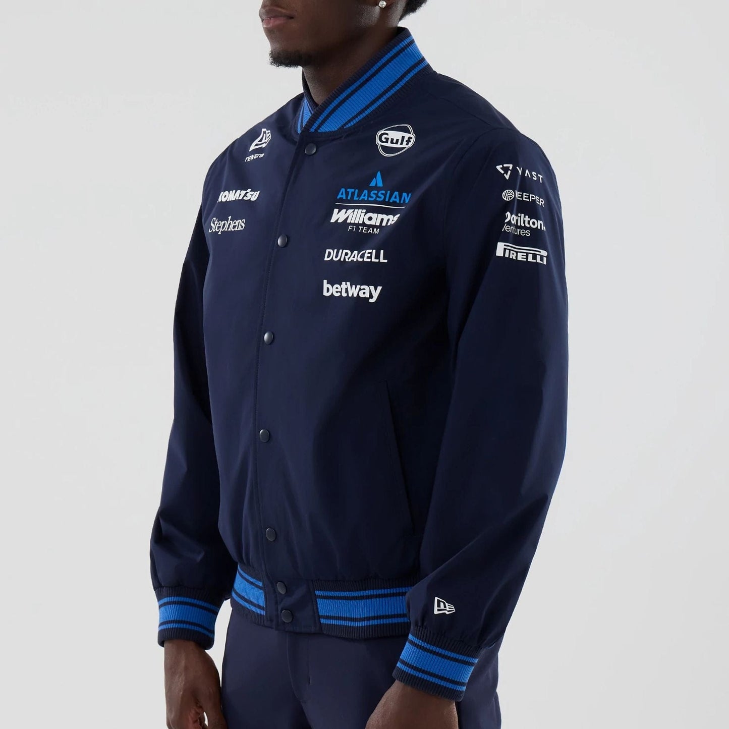 The model is wearing this Atlassian Williams F1 Team Varsity Jacket in navy. 7