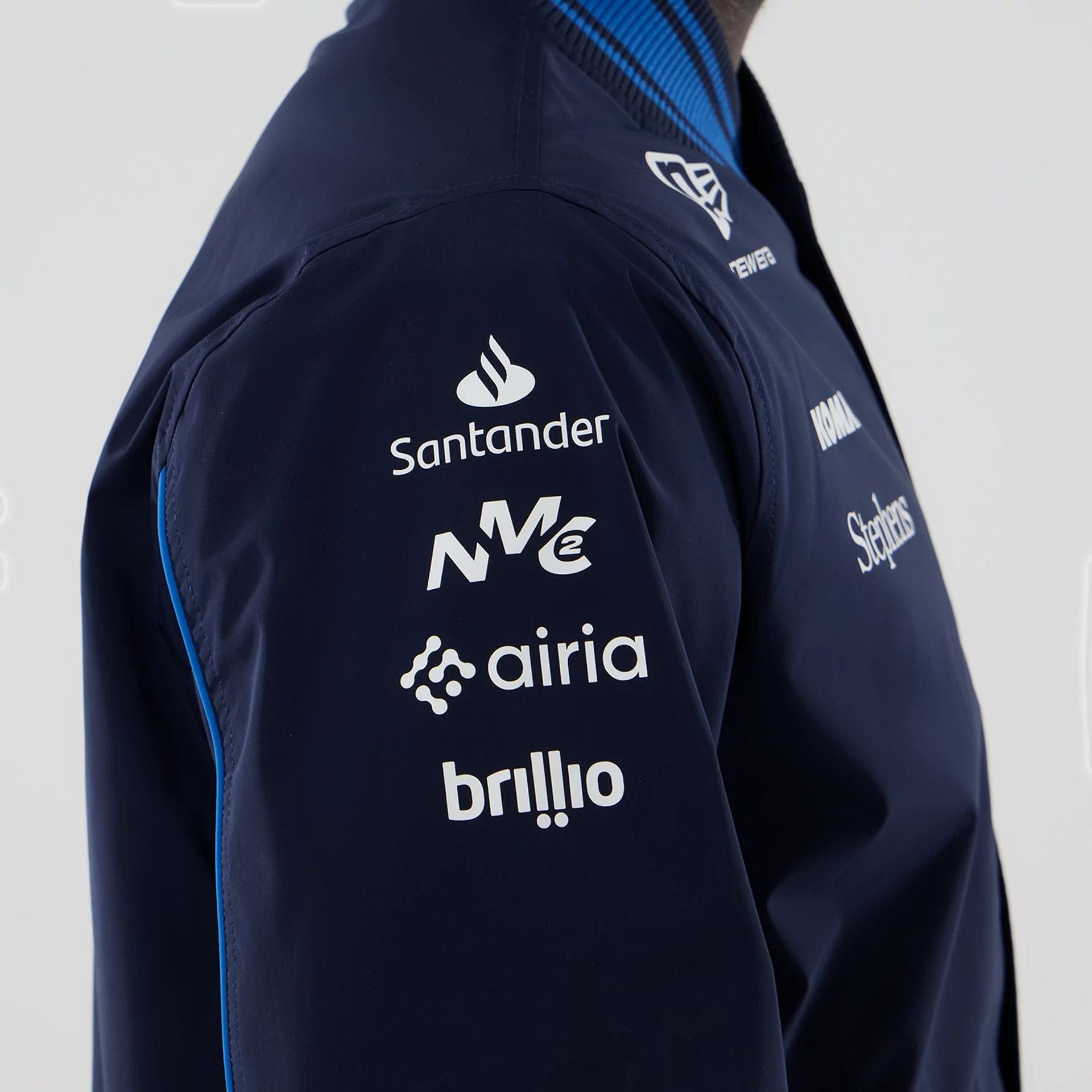 The model is wearing this Atlassian Williams F1 Team Varsity Jacket in navy. 4