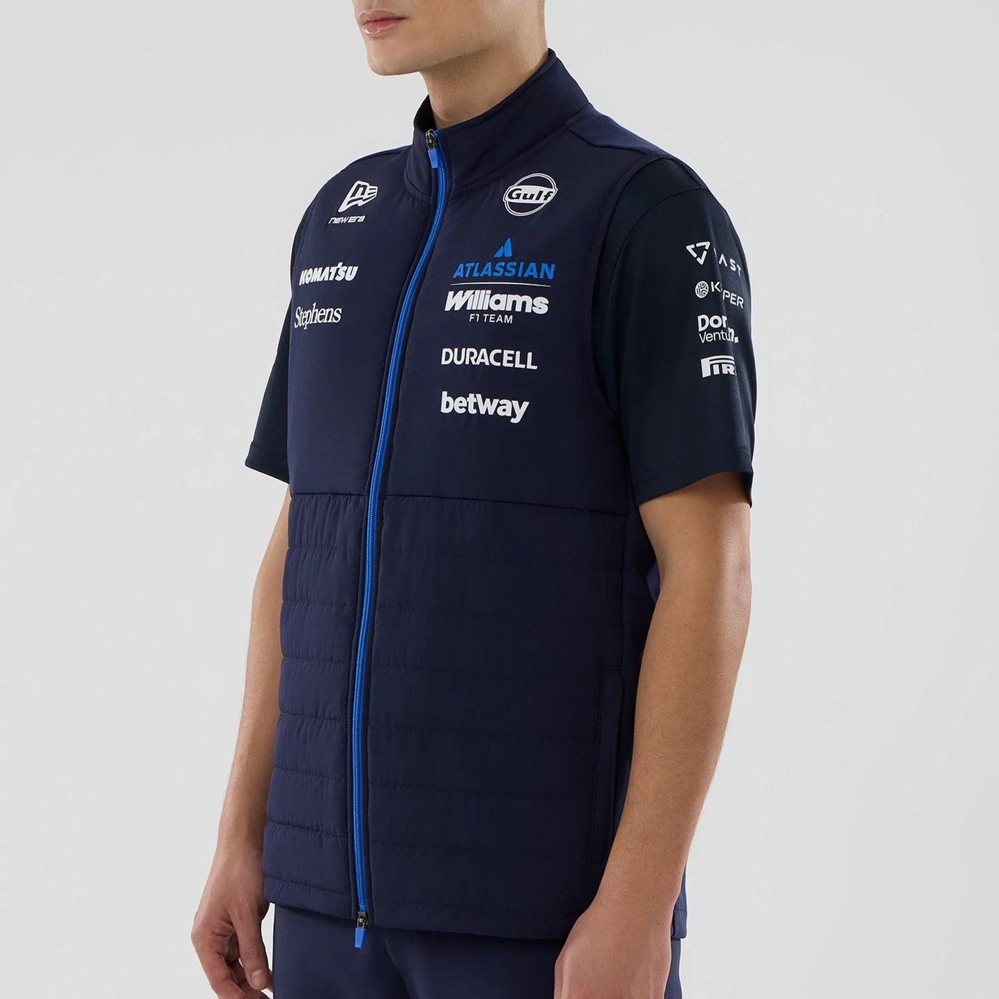 The model is wearing this Atlassian Williams F1 Team Gilet in navy. 5