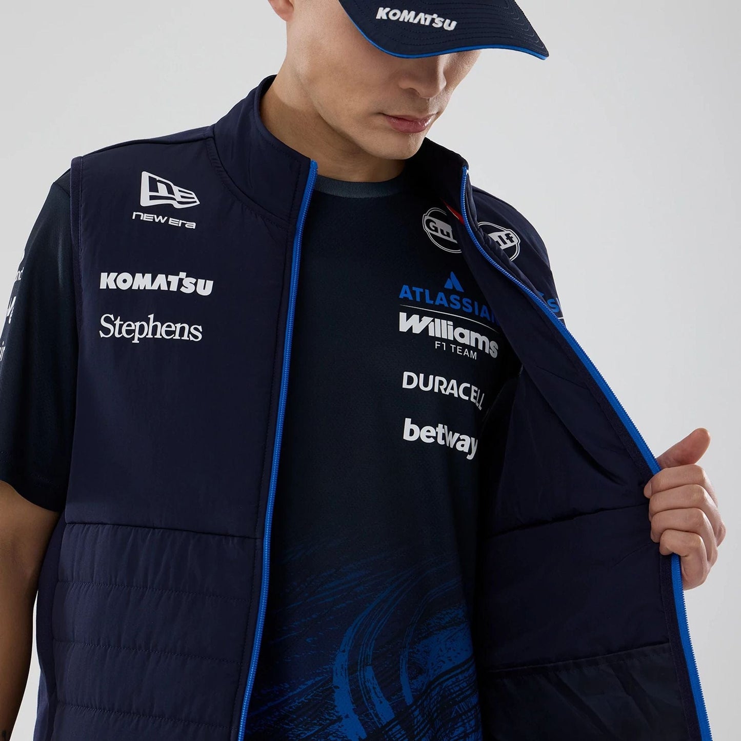The model is wearing this Atlassian Williams F1 Team Gilet in navy. 7