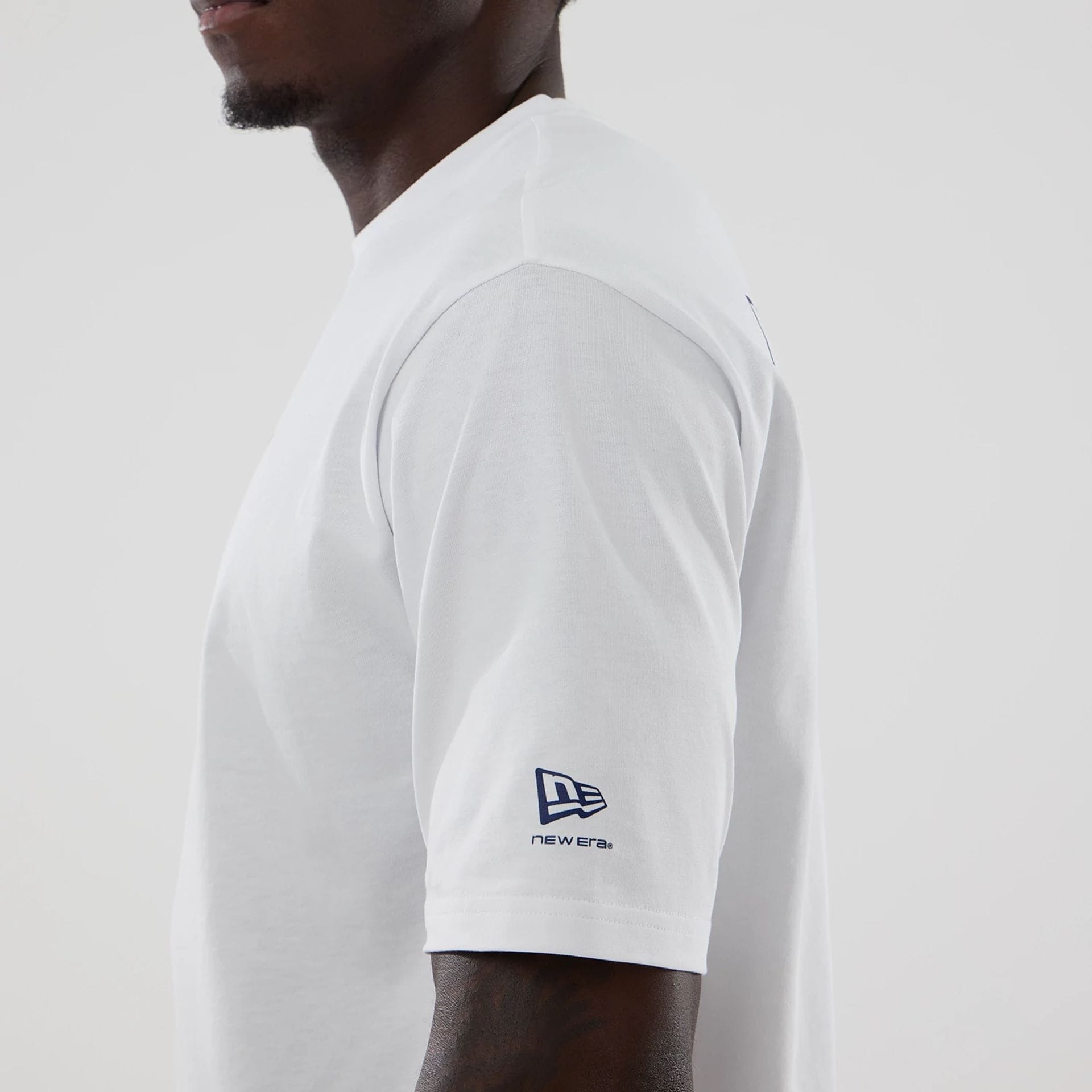 The model is wearing this Atlassian Williams F1 Team Japan 1996 World Champions Oversized T-Shirt in white. 5