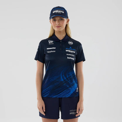 The model is wearing this Womens Atlassian Williams F1 Team Tech Polo T-shirt in navy. 1
