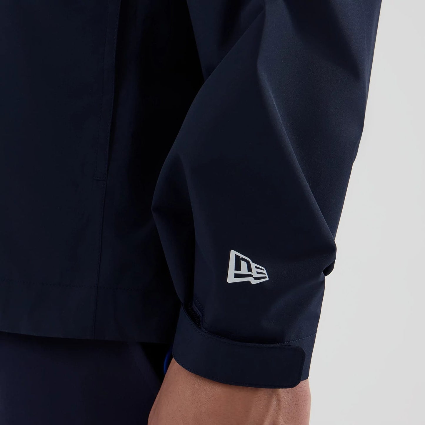 The model is wearing this Atlassian Williams F1 Team Rain Jacket in navy. 5