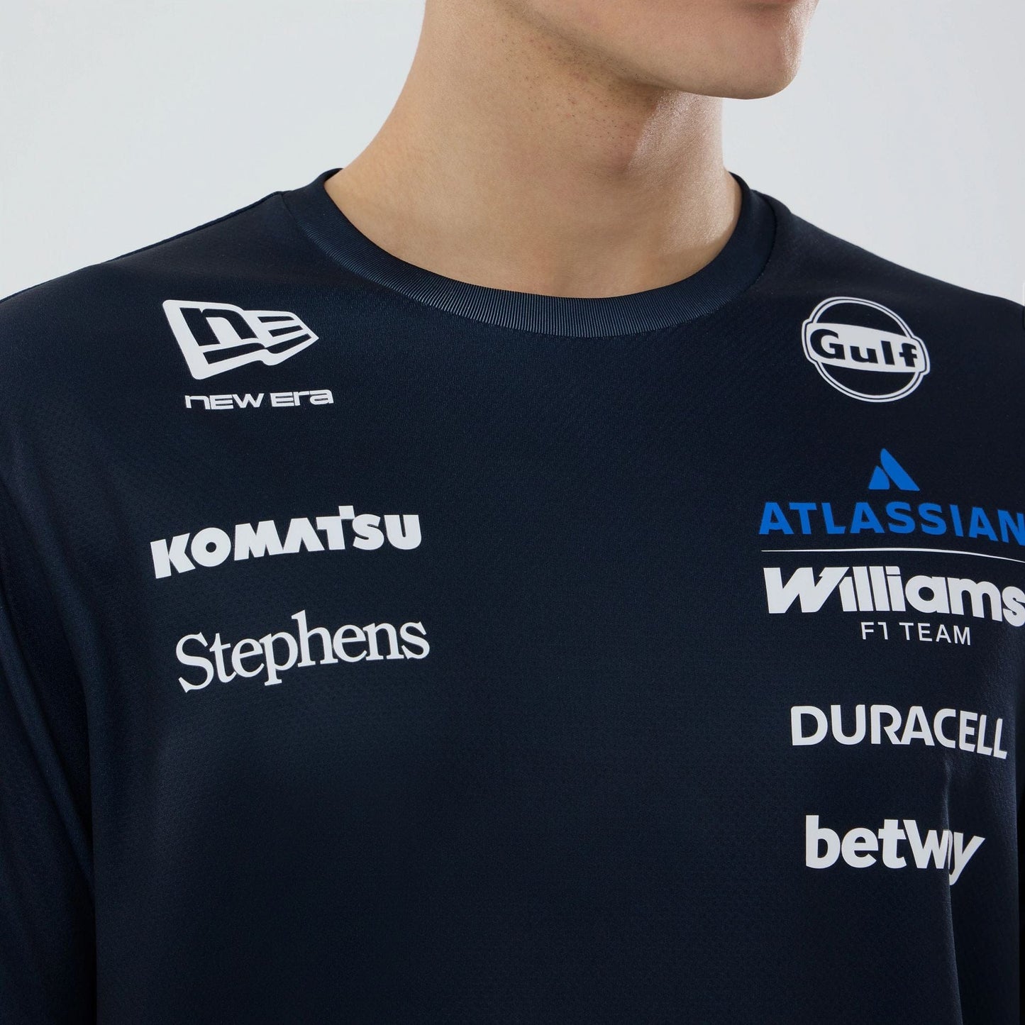 The model is wearing this Atlassian Williams F1 Team Tech T-shirt in navy. 3