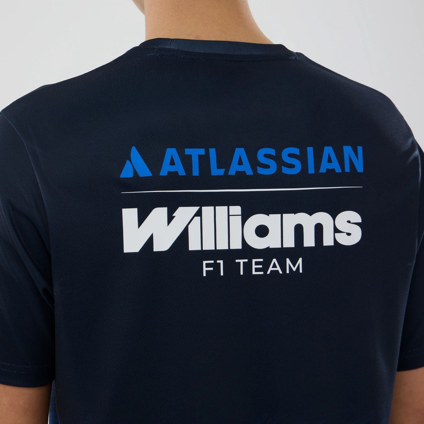 The model is wearing this Atlassian Williams F1 Team Tech T-shirt in navy. 7