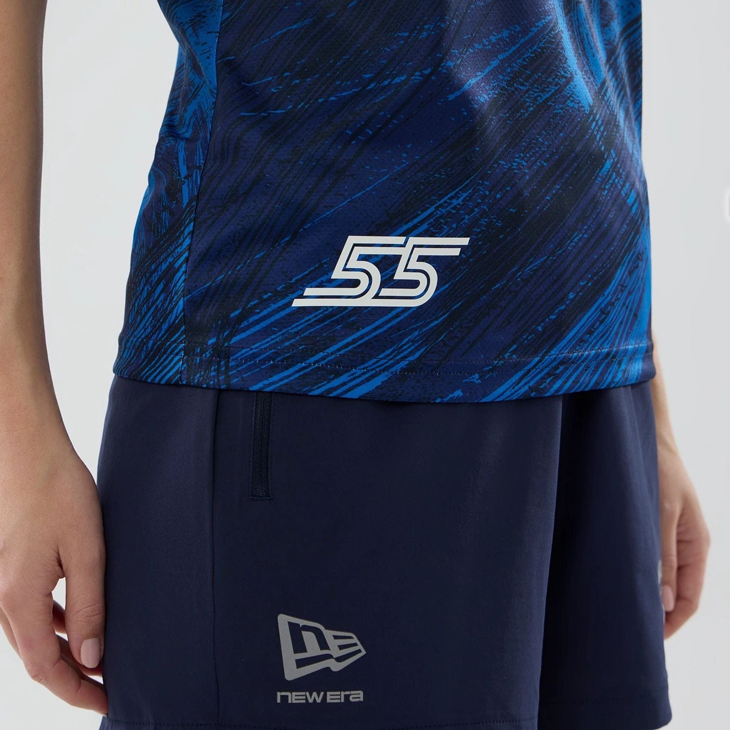 The model is wearing this Womens Carlos Sainz Atlassian Williams F1 Team Tech T-shirt in navy. 5