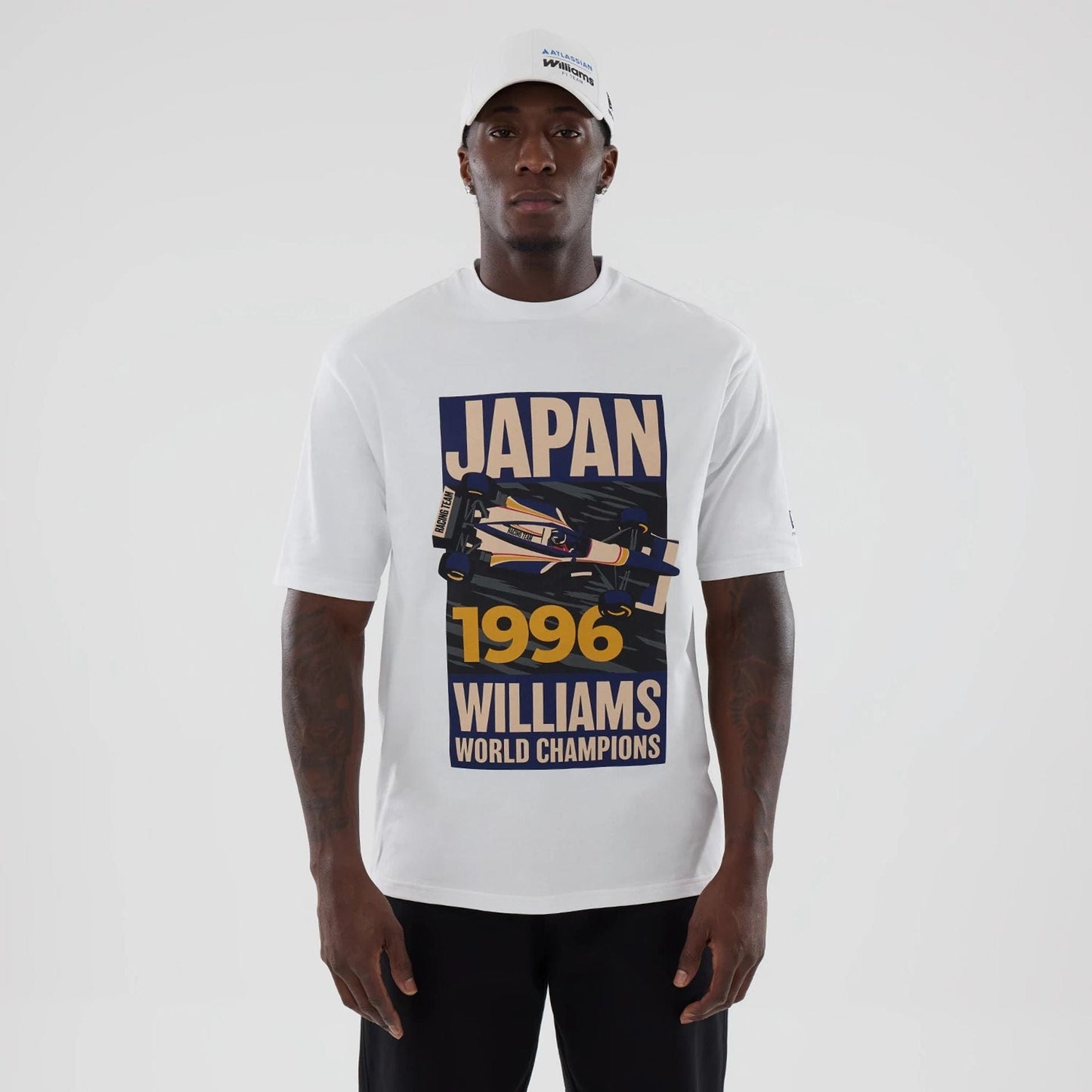 The model is wearing this Atlassian Williams F1 Team Japan 1996 World Champions Oversized T-Shirt in white. 7