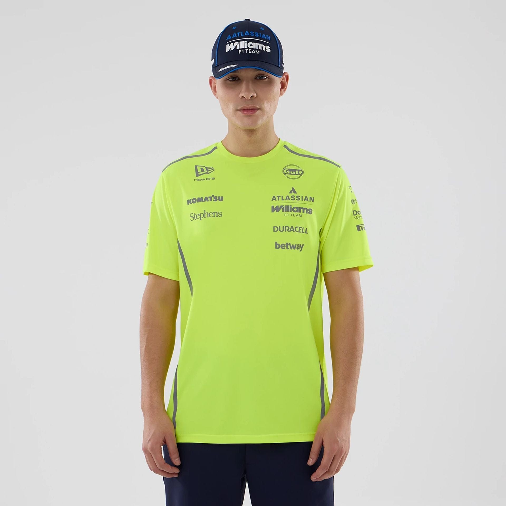 The model is wearing this Atlassian Williams F1 Team Set Up T-Shirt in yellow. 1
