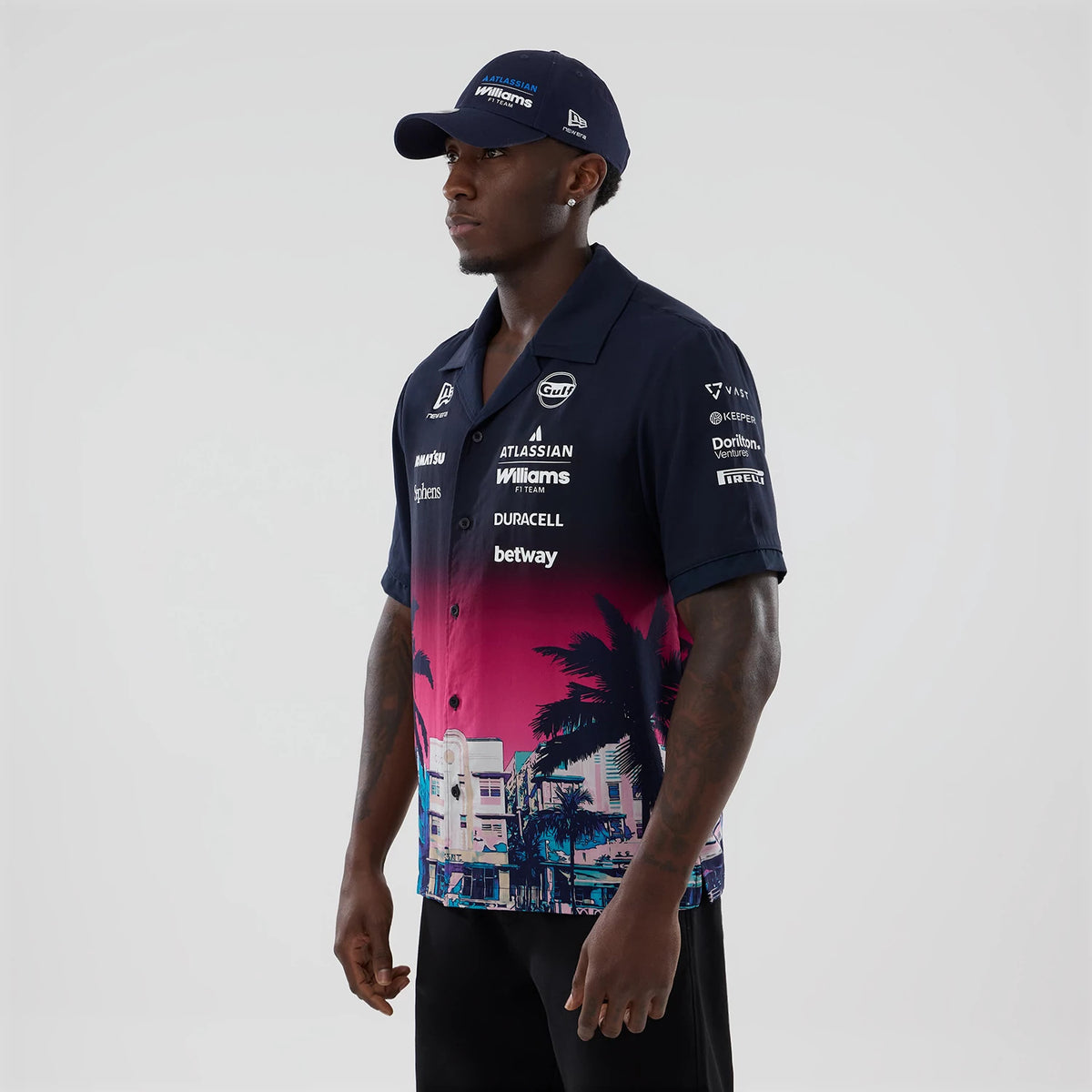 The model is wearing this Miami Atlassian Williams F1 Team Short Sleeve Shirt in navy. 6