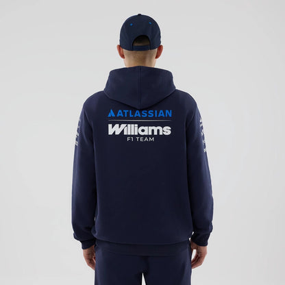 The model is wearing this Replica Atlassian Williams F1 Team Pullover Hoodie in navy. 2
