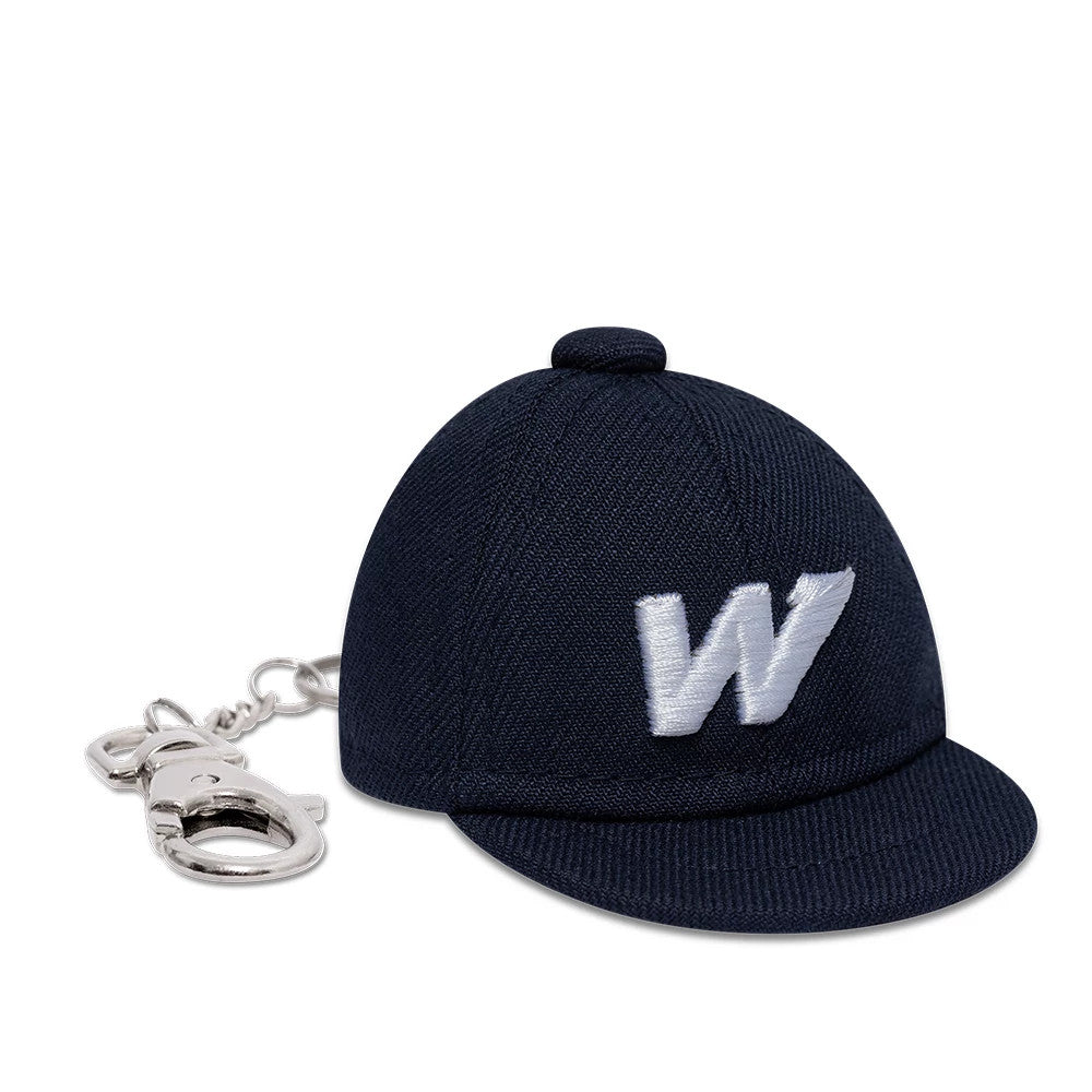 New Era Williams Navy Cap Key Chain, three-quarter view showing a white embroidered W on the front panel of the miniature dark navy cap, complete with a small top button and a curved visor, attached to a keyring.