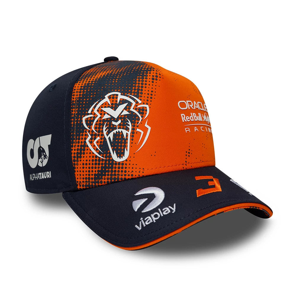 Red Bull Racing Max Verstappen Dark Blue New Era 9FORTY A-Frame Adjustable Cap, three-quarter view showing a prominent orange lion graphic on the front panel and embroidered Oracle and Viaplay logos on the orange crown and dark blue visor.