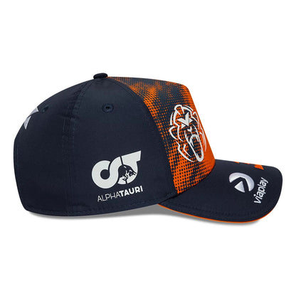 Red Bull Racing Max Verstappen Dark Blue New Era 9FORTY A-Frame Adjustable Cap, side view showing the AlphaTauri logo in white on the structured dark blue crown, with an orange and blue graphic on the front panel and a curved visor.