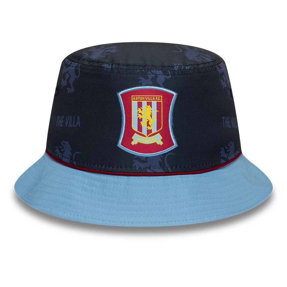New Era Aston Villa FC 96 Navy Bucket Hat, front view showing the embroidered Aston Villa crest in red, blue, and yellow on the navy crown, with lion patterns and THE VILLA text, finished with a sky blue visor and burgundy accent.