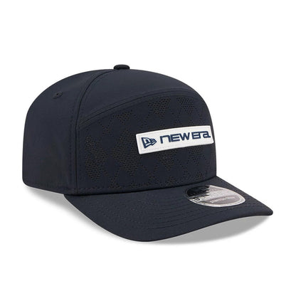 Pictured is this New Era Golf 9SEVENTY Split Panel Stretch Snap cap in navy. 4