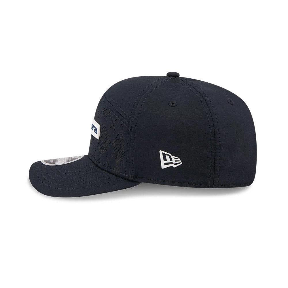 Pictured is this New Era Golf 9SEVENTY Split Panel Stretch Snap cap in navy. 5
