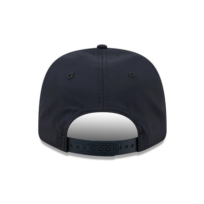 Pictured is this New Era Golf 9SEVENTY Split Panel Stretch Snap cap in navy. 7