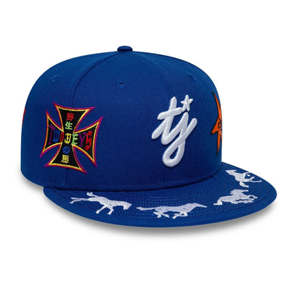 Pictured is this Twojeys X New Era 59FIFTY Fitted cap in blue. 3