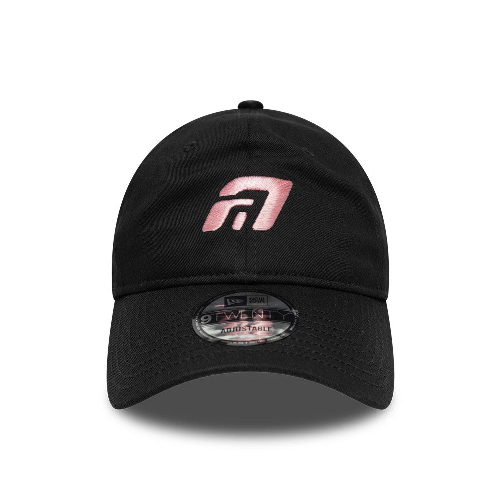 Williams Alex Albon Black New Era 9TWENTY Adjustable Cap, front view showing a rose pink embroidered A logo on the unstructured black crown, pre-curved black visor, and the 9TWENTY size sticker placed on the centre of the visor.