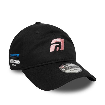 Williams Alex Albon Black New Era 9TWENTY Adjustable Cap, front view showing a pink embroidered A logo on the front panel, a curved black visor with a 9TWENTY size sticker, and white Williams F1 team branding on the left side.