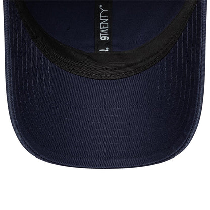 Williams Traditional Washed Navy New Era 9TWENTY Adjustable Cap, inside view showing the dark navy undervisor, black sweatband, and black taping with white 9TWENTY branding along the inner seam.