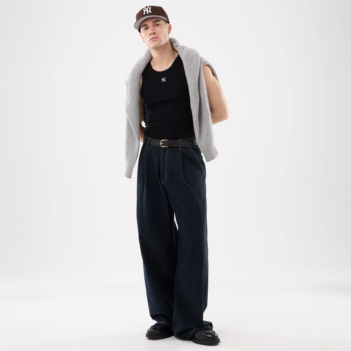 The model is wearing this MLB Rib New York Yankees Vest in black. 12