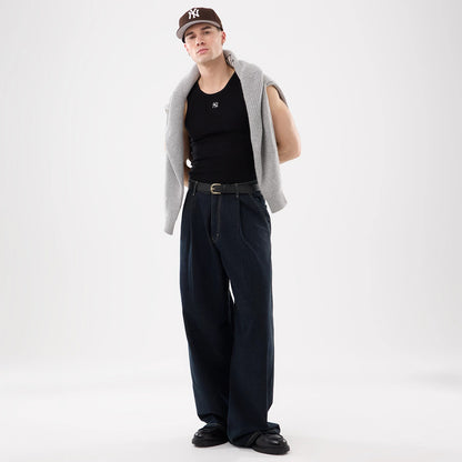 The model is wearing this MLB Rib New York Yankees Vest in black. 12