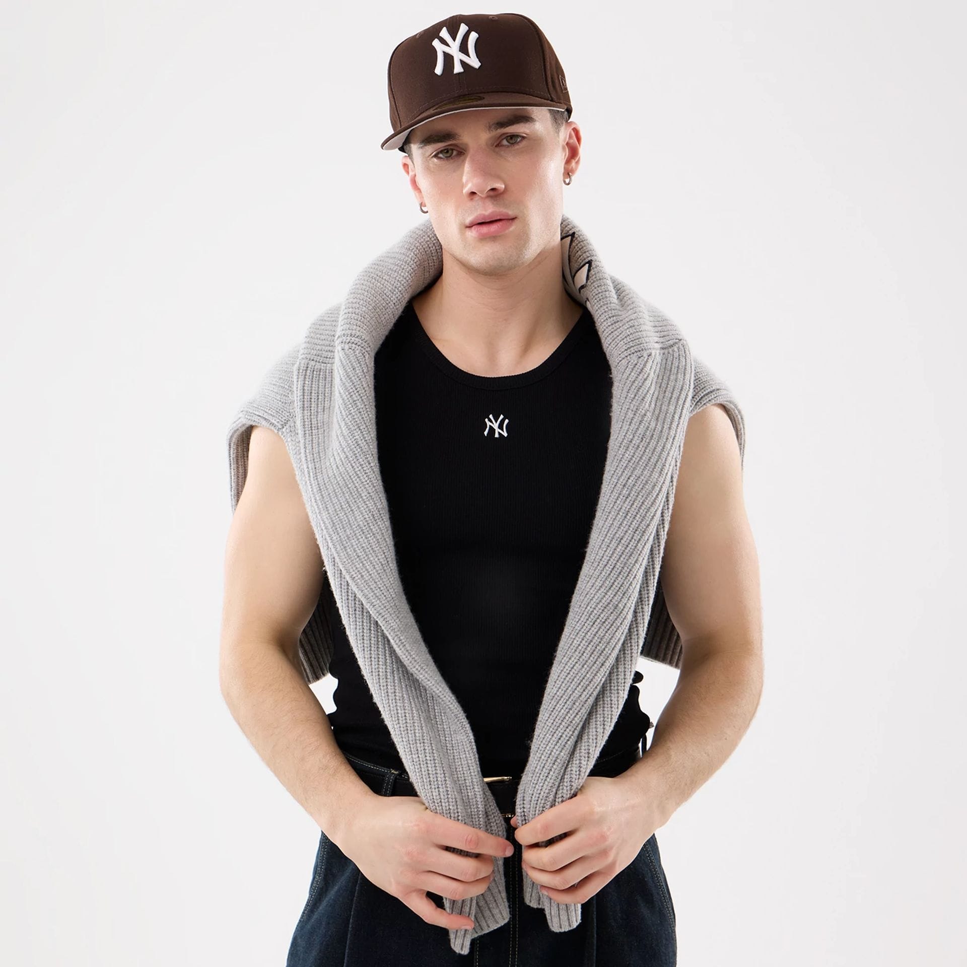 The model is wearing this MLB Rib New York Yankees Vest in black. 16