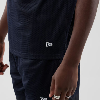 The model is wearing this New Era Mesh Oversized T-Shirt in navy. 5
