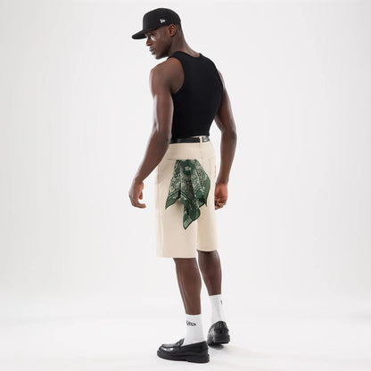 The model is wearing this New Era Rib Vest in black. 17