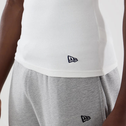 The model is wearing this New Era Rib Vest in white. 6