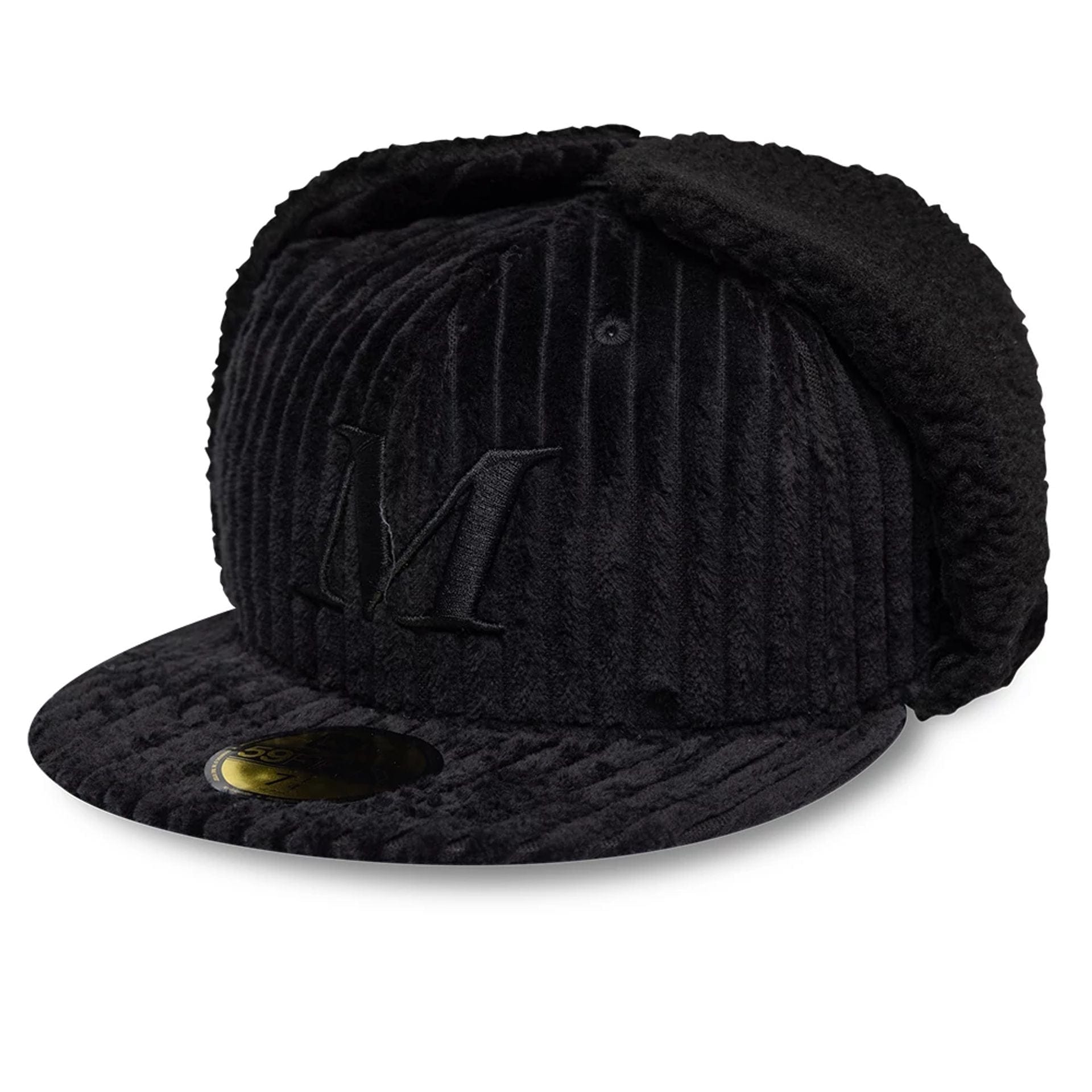 Pictured is this Mains X New Era Cord Dogear 59FIFTY Fitted cap in black. 1