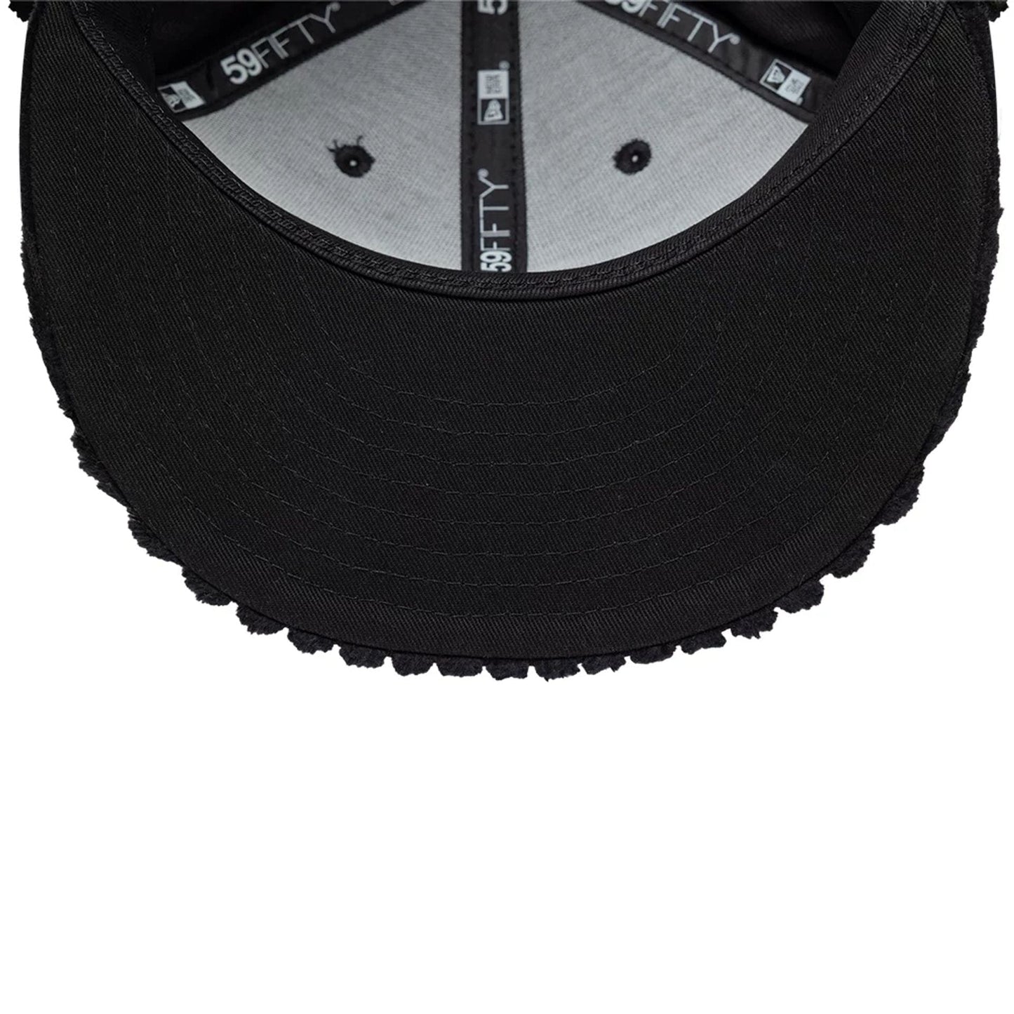 Pictured is this Mains X New Era Cord Dogear 59FIFTY Fitted cap in black. 11