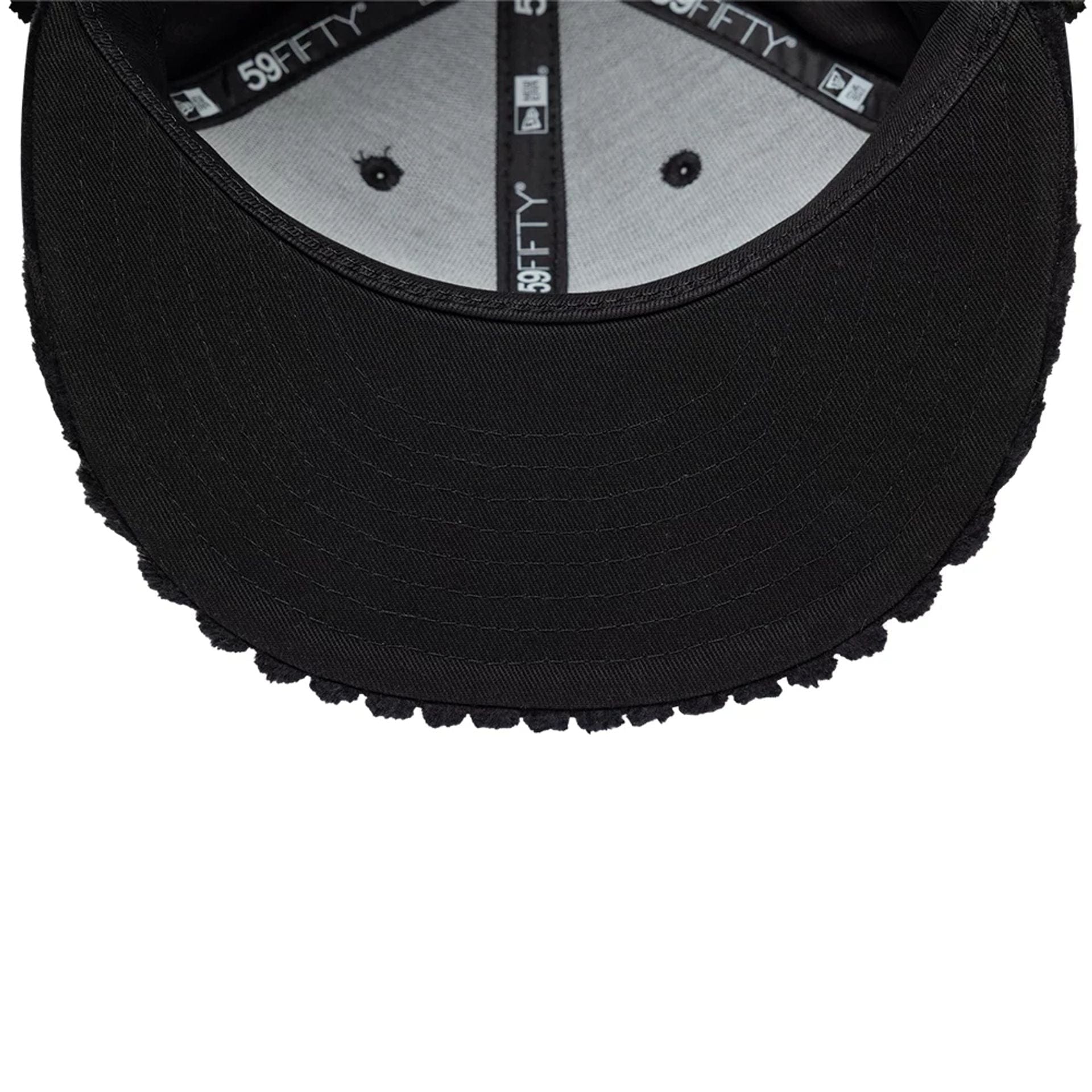 Pictured is this Mains X New Era Cord Dogear 59FIFTY Fitted cap in black. 11