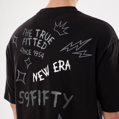 The model is wearing this New Era 59FIFTY Day Graphic T-Shirt in black. 5