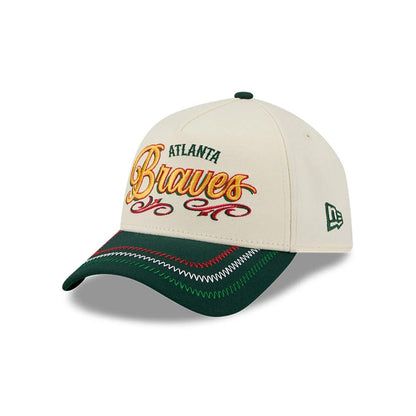 Pictured is this MLB Cinco De Mayo Atlanta Braves 9FORTY A-Frame Adjustable cap in cream & green. 1