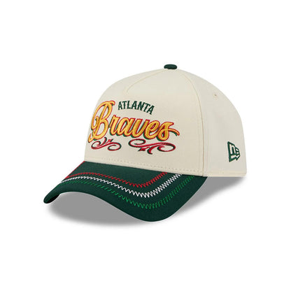 Pictured is this MLB Cinco De Mayo Atlanta Braves 9FORTY A-Frame Adjustable cap in cream & green. 1