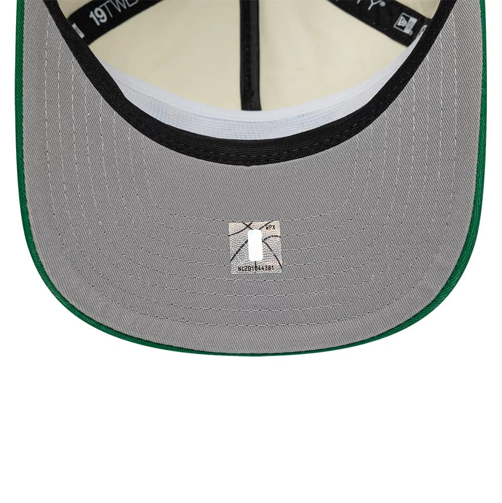 Pictured is this NBA Hardwood Classic Boston Celtics 19TWENTY Adjustable cap in cream & green. 2